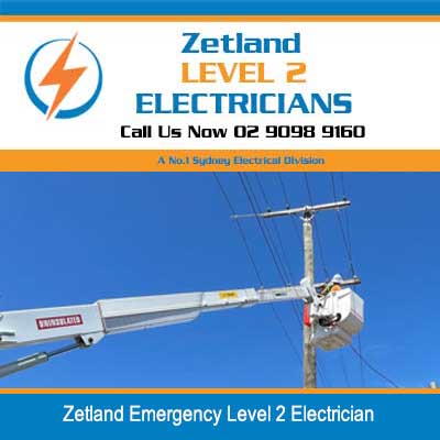 Emergency level 2 electrician working on power lines from elevated platform in Zetland